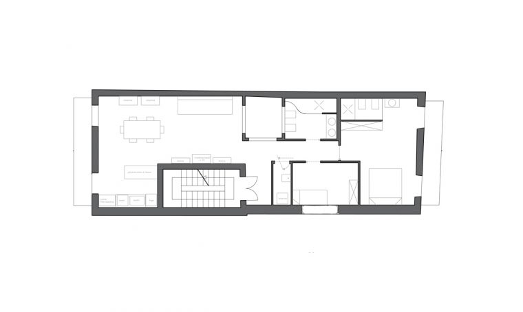 Soggiorno con cucina open (e mattoni a vista effetto loft)