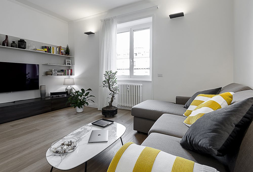 Un bilocale più funzionale con cucina a vista e cabina armadio