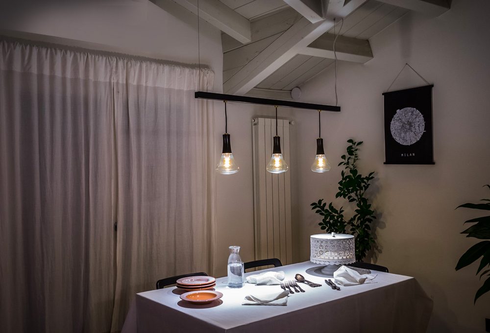 Illuminare il tavolo sotto le travi